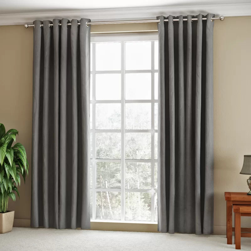 Graphite velvet eyelet curtains pair by Nylsa