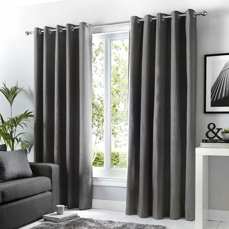Graphite velvet eyelet curtains pair by Nylsa